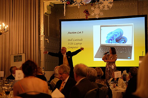 John Dryden and Sophie Thornton running the auction 