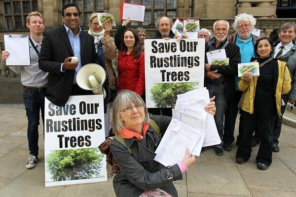 Shaffaq with Rustlings Road tree campaigners.