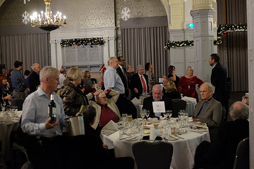 A group of Sheffield Lib Dems in the victoria hotel. They are talking among themselves, some seated and some standing