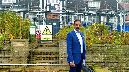 Mohammed Mahroof stood outside a closed Rose Garden Cafe